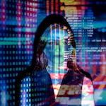 Photo by ThisIsEngineering of a woman with computer screen image superimposed
