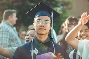 photo by Vantha Thang of Asian student graduating. Source: Pexels