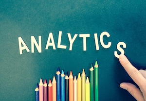 photo by Timur Saglambilek of the word Analytics spelled with moveable cream-colored letters on green background. Source: Pexels