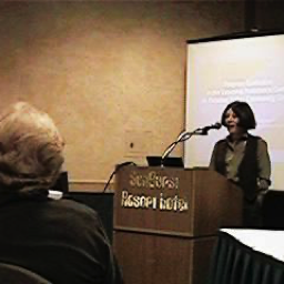 photo of Gwyn Enright giving Keynote
Address